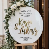 Koło z imionami pary młodej z pleksi